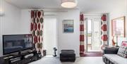 Lounge with patio doors, 14 Belvedere Court, 37 Marine Drive, Paignton, Devon