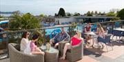 Relax by the outdoor pool at Beverley Bay, Paignton, Devon