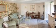 Cottage-style apartment with comfortable suite & dinning area at Court Prior Luxury Apartment, Torquay, Devon